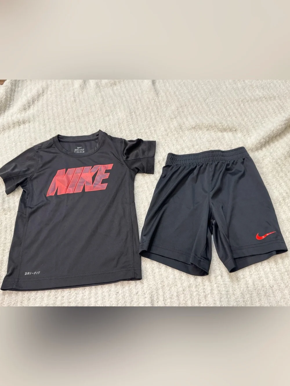 Nike Kids Black Short Sleeve Tee with Red Graphic